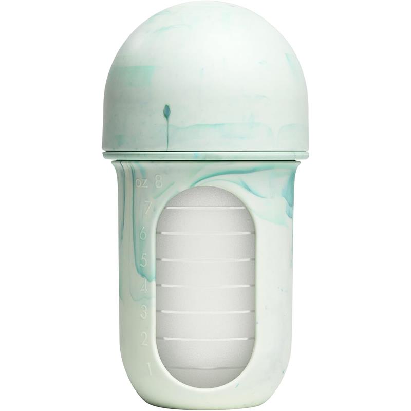 Boon Nursh 8 oz baby bottle in mint tie-dye pattern with a measuring scale and a soft silicone pouch.