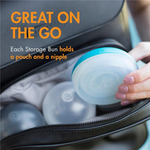 Boon NURSH Storage Buns in a black bag; holds pouches and nipples, showcasing practical storage for on-the-go use.