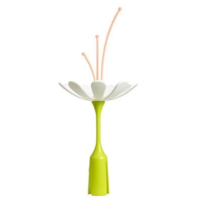 Boon POKE & STEM drying rack accessories in floral design with a green base and pink drying stems for utensil drying.