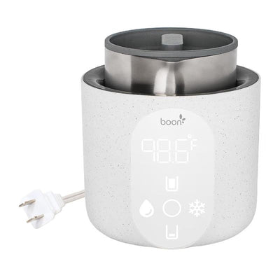 Boon Tempro Direct Heat Breastmilk Warmer with a digital display showing 98.6°F, designed for warming milk.