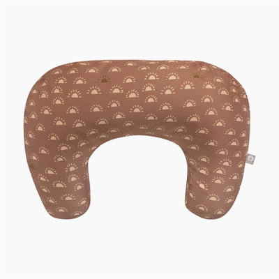 Boppy nursing pillow in clay color with gold sun pattern, designed for comfortable breastfeeding support.