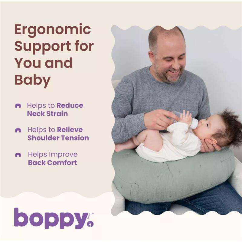 Boppy Nursing Pillow Luxe in Chestnut Muslin, supporting a father feeding a baby, highlighting ergonomic benefits.