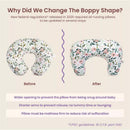Boppy Nursing Pillow Luxe in Sea Green Muslin, showcasing design changes for safety compliance with visible floral patterns and text details.
