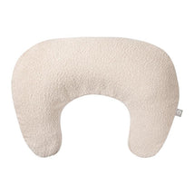 Boppy nursing pillow in oatmeal boucle fabric, designed for breastfeeding support and comfort.