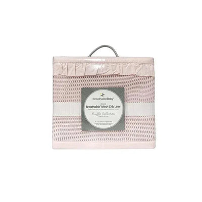 BreathableBaby Breathable Mesh Crib Liner in blush, featuring a ruffle design and a central label with product details.