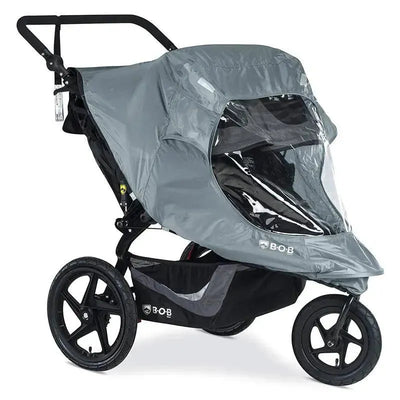 Weather shield for the Britax Gear Duallie Swivel Wheel Stroller, designed to protect against rain and wind.