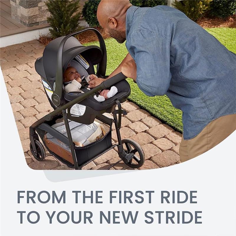Britax Willow Brook Travel System featuring a baby in a car seat, with a man interacting affectionately beside it.