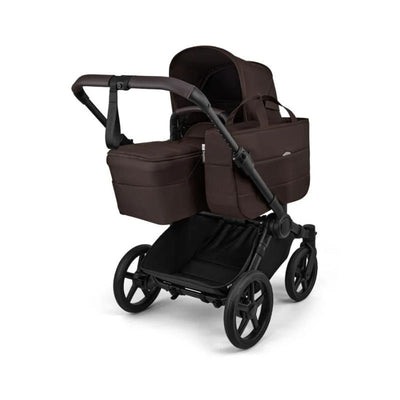Bugaboo Donkey 6 Complete Stroller in Black/Cocoa Brown with a carrycot and spacious storage basket.