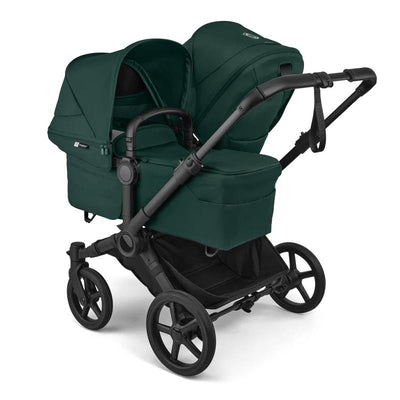 Bugaboo Donkey 6 Complete Stroller in black and fern green, featuring two seats, adjustable canopies, and large wheels.