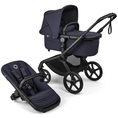 Bugaboo Fox 5 Renew Complete Bassinet and Seat in Deep Indigo, featuring a black frame with a light canopy and seat.