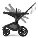 Bugaboo Fox 5 Renew Complete Bassinet & Seat in Deep Indigo, featuring a black chassis and adjustable seat position.