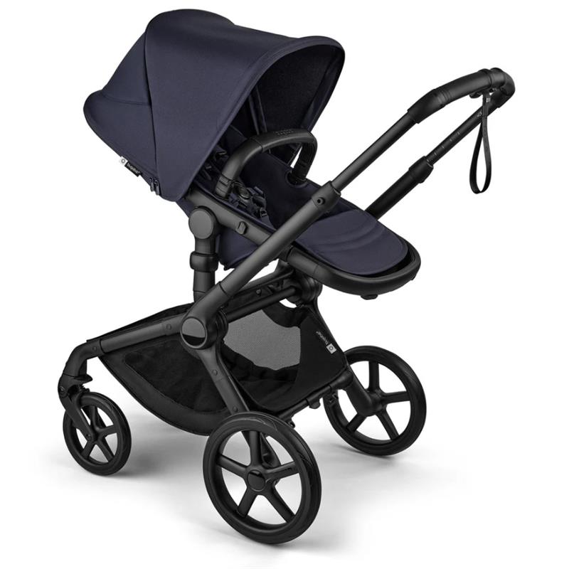 Bugaboo Fox 5 Renew Complete Bassinet & Seat in Deep Indigo, featuring a sleek design with black chassis and large wheels.