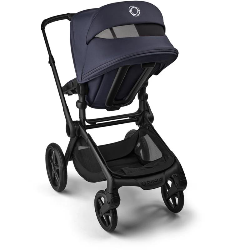 Bugaboo Fox 5 Renew Complete Bassinet & Seat in Deep Indigo with a black frame and large wheels, highlighting its modern design.