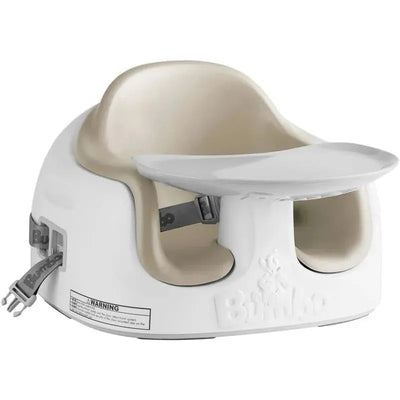 Taupe Bumbo 3-in-1 Multi Seat with adjustable height, white base, and removable tray for feeding or play.