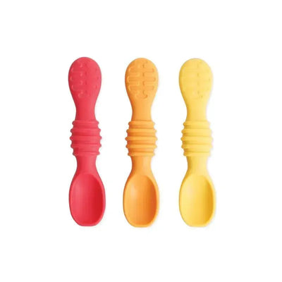 Bumkins silicone baby dipping spoons in red, yellow, and orange, featuring ergonomic grips and a flexible design.