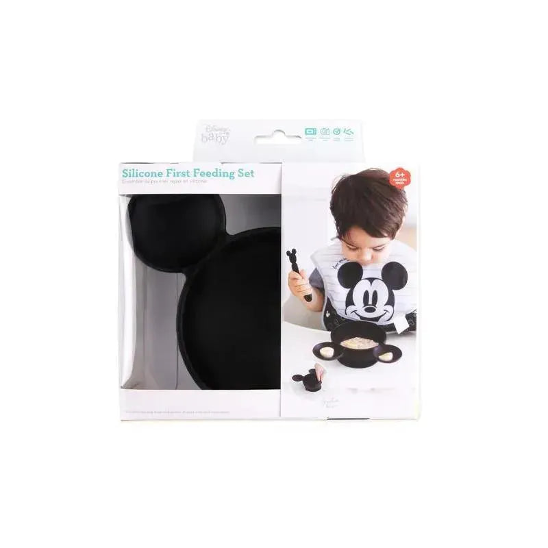 Silicone first feeding set featuring black Mickey Mouse-themed bowl, spoon, and suction design, suitable for infants.