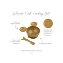 Gold silicone first feeding set featuring a bowl with a Mickey Mouse design and a matching spoon.