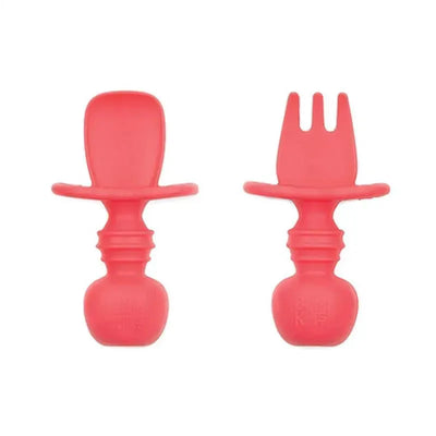 Silicone Chewtensils by Bumkins in red, featuring a spoon and fork design for easy toddler use.