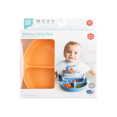Silicone Grip Dish by Bumkins in tangerine, featuring a divided design for baby meals, alongside a smiling baby wearing a bib.