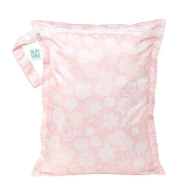 Pink floral wet bag by Bumkins, featuring a zipper closure and a handle for easy carrying, ideal for storage.
