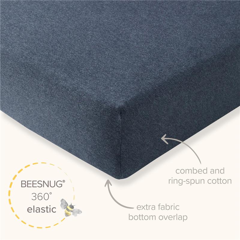Organic cotton crib sheet in limestone color with 360° elastic, featuring combed cotton and an extra fabric bottom overlap.