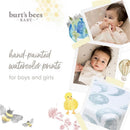 Organic cotton crib sheets set featuring hand-painted watercolor prints, suitable for boys and girls, with a soft color palette.