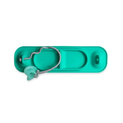 Busy Baby Mini Mat in spearmint color, featuring a silicone surface with suction cups for securing toys during mealtime.