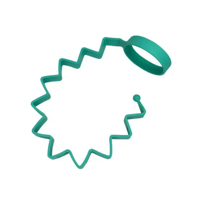 Teal bottle holder designed to secure a baby bottle, featuring a star-like shape with a handle for easy attachment.