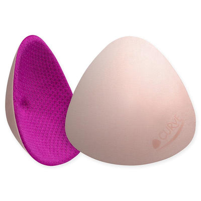 Fuchsia nursing pads in a triangular shape, showing a textured pink surface and a smooth purple interior.