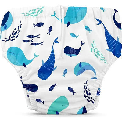 Reusable swim diaper featuring a playful whale design in various blue shades on a white background.