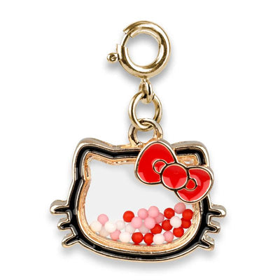 Gold Hello Kitty shaker charm featuring a red bow and colorful bead contents inside. Ideal for Charm It! collections.