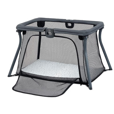 Chicco Alfa Lite Ultra-Lightweight Portable Playard featuring a black mesh design and a white patterned mattress.