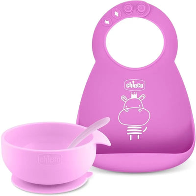 Chicco Easy Start Silicone Feeding Gift Set 6M+ in pink, includes a bowl with a spoon and a bib featuring a hippo design.