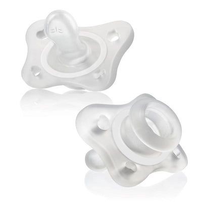 Clear orthodontic pacifiers in a two-pack, featuring a mini size and rounded shapes, designed for soothing infants.