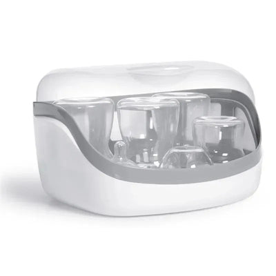 Chicco NaturalFit Microwave Steam Sterilizer in gray with a transparent lid, designed to sterilize baby bottles and accessories.