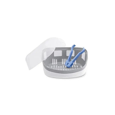 Chicco NaturalFit Microwave Steam Sterilizer in gray, with a lid partially open and blue tongs resting inside.