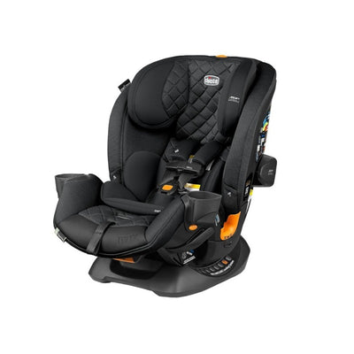 Chicco Onefit Max Cleartex All-In-One Car Seat in black with orange accents, featuring adjustable headrest and cup holders.