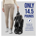 Lightweight Chicco Urbino stroller in olive color, folded and held by a woman, highlighting portability at only 14.5 pounds.
