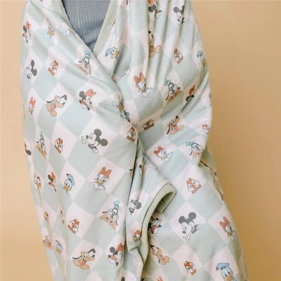 Hooded towel featuring Mickey Mouse and friends in a colorful, playful pattern, ideal for big kids.