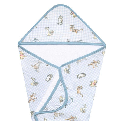 Hooded towel featuring a blue gingham pattern with Winnie the Pooh and friends illustrations, soft white interior.