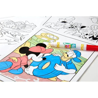 Crayola Color Wonder coloring pad featuring Mickey Mouse and Donald Duck, with a marker resting on a completed color page.