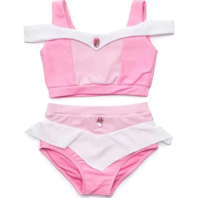 Pink two-piece swimsuit set with a fitted top and ruffled bottom, featuring a decorative gem embellishment.