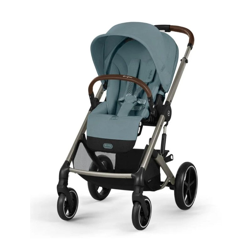 Cybex Balios S Lux stroller in Stormy Blue with a brown handle and a storage basket underneath.