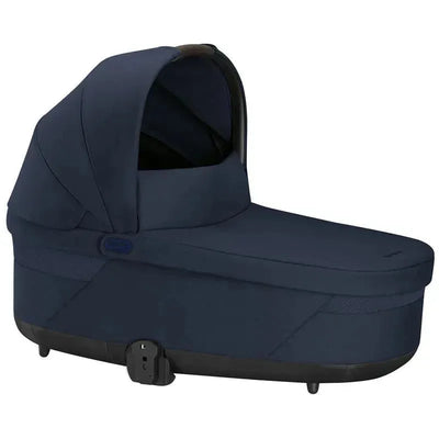 Cybex Cot S Lux 2 in Ocean Blue, featuring a sleek design with a hood and sturdy base, ideal for infants.