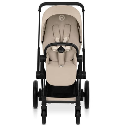 Cybex E-Priam stroller with a matte black frame and cozy beige lux seat, viewed from the front, showcasing safety harness and large wheels.