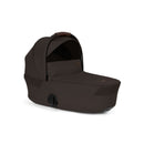Foldable Cybex Gazelle S Cot in chocolate brown, designed for infants with a sleek, modern look.