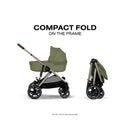Foldable Cybex Gazelle S Cot in Moss Green, showcasing compact fold feature on the stroller frame.