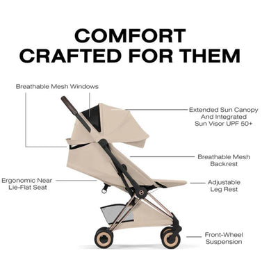 Cybex Platinum Coya stroller with a rose gold frame and cozy beige seat, featuring breathable mesh elements and an extended sun canopy.