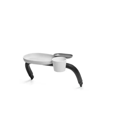 Snack tray attachment for Cybex Platinum stroller, featuring a flat surface, cup holder, and a small compartment.