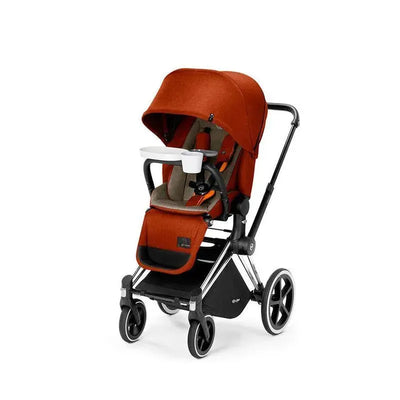 Cybex Platinum Stroller in a vibrant red fabric, featuring a snack tray and adjustable canopy.
